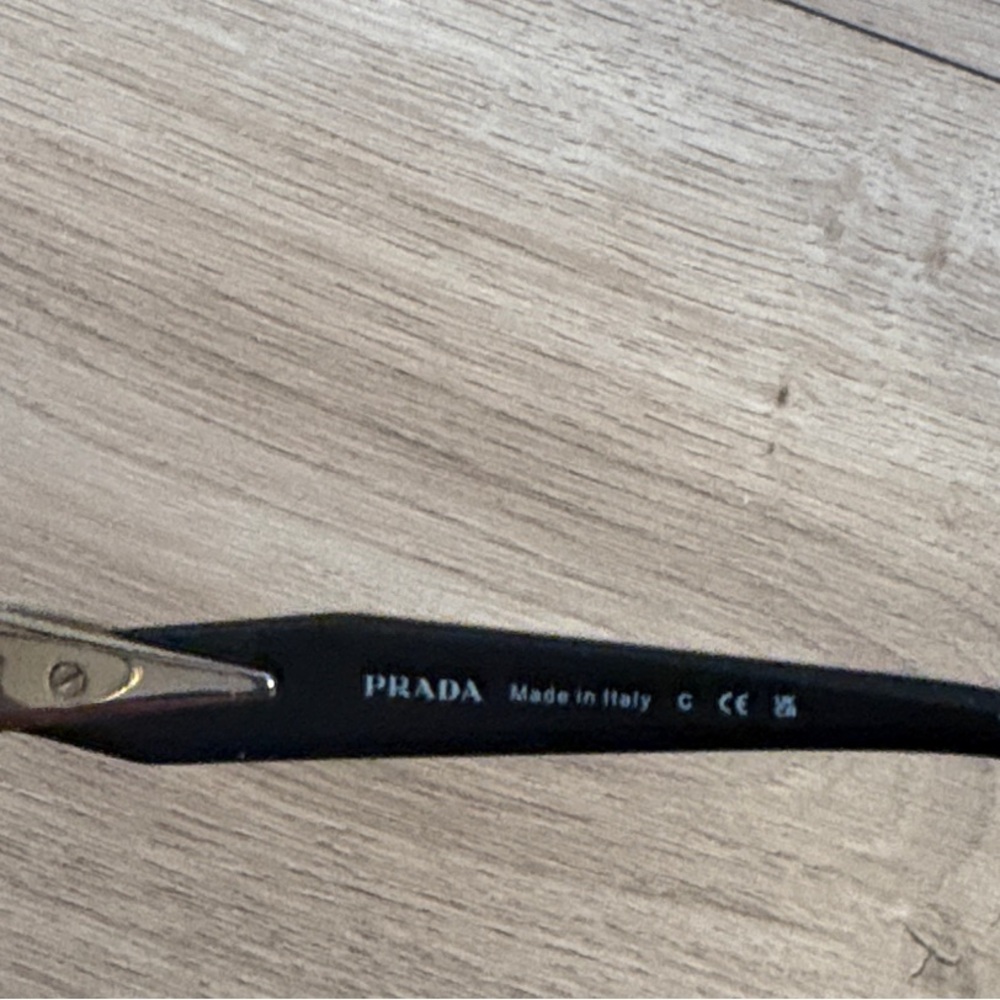 Prada Oval Black and Gold Sunglasses - Picture 3 of 4